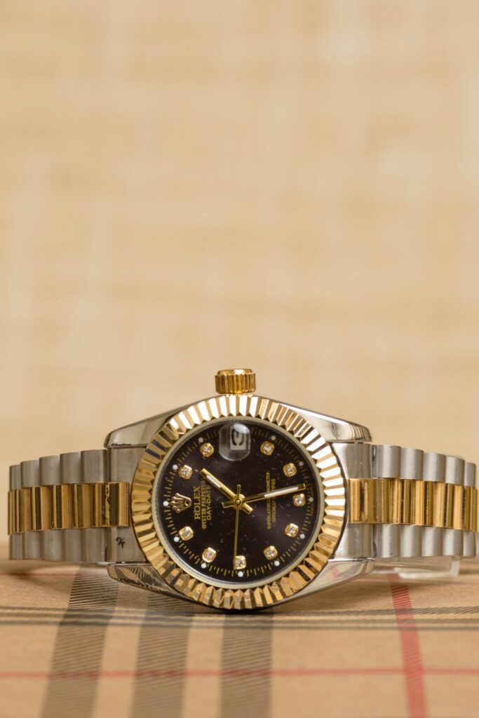 rolex datejust on a burberry scarf, the perfect luxury gift for Valentine's Day